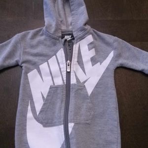 Nike zippered one piece outfit for baby. Grey and white  Never worn. Only washed